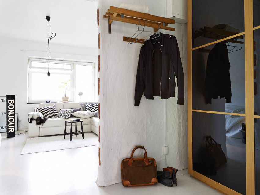 For the hallway, it is better to use a sliding wardrobe with a glossy facade For the hallway, it is better to use a sliding wardrobe with a glossy facade