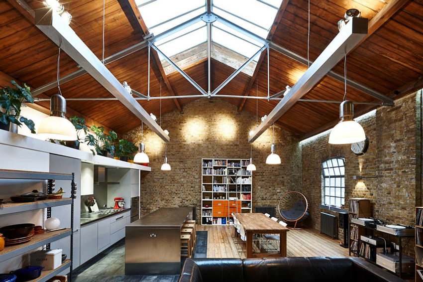 Una habitación estilo loft que combina una cocina y una sala de estar no debe estar sobrecargada con decoración y muebles innecesarios. Una habitación estilo loft que combina una cocina y una sala de estar no debe estar sobrecargada con decoración y muebles innecesarios.